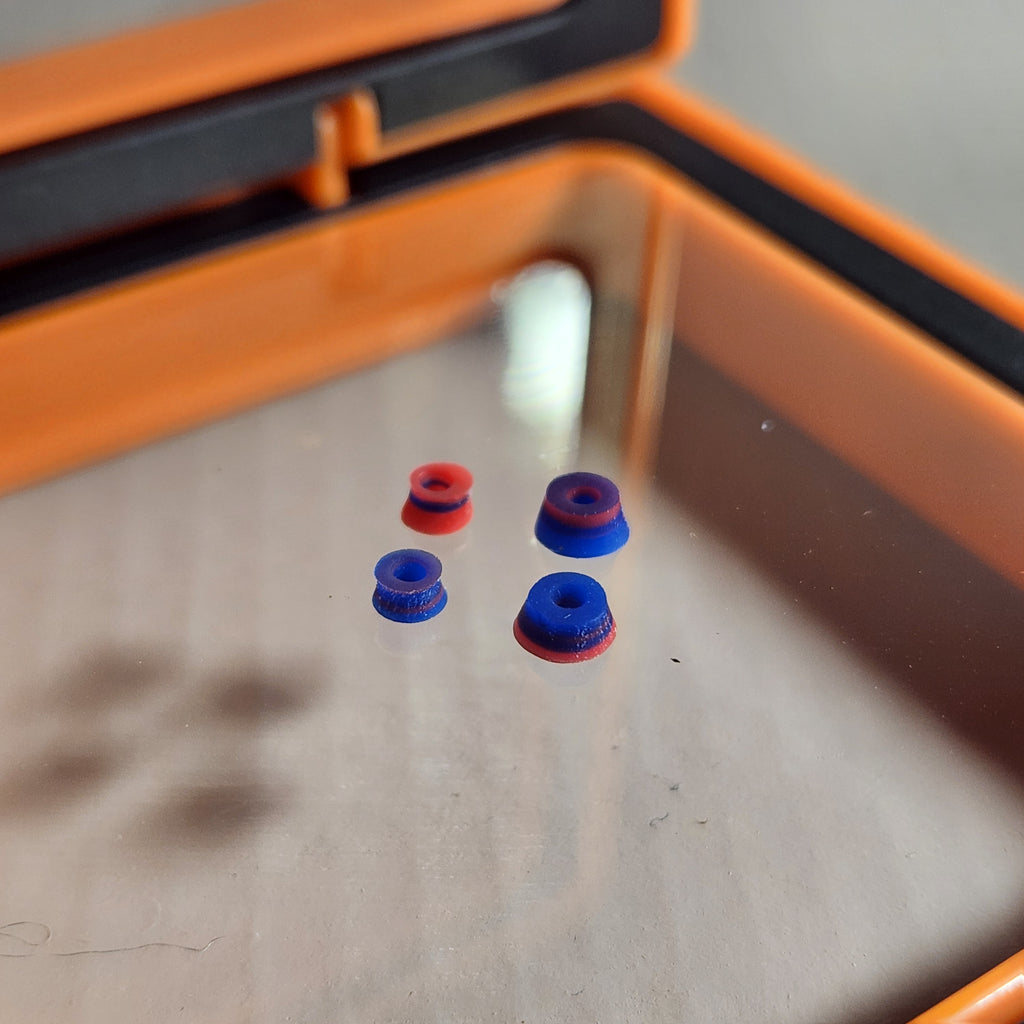 Red & Blue | 78a Arkonic Fingerboard Bushings - UV Fluorescent
