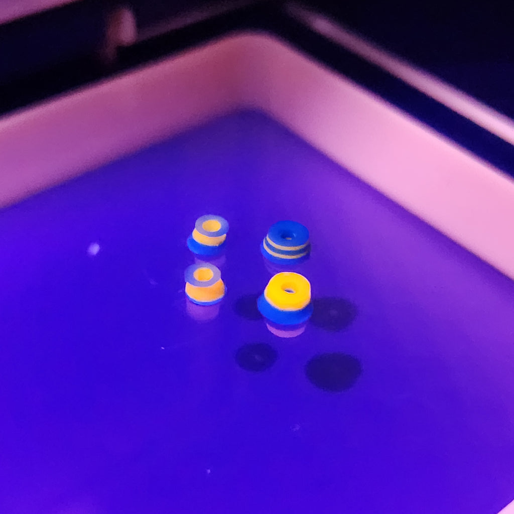 Blue & Orange | 78a Arkonic Fingerboard Bushings - UV Fluorescent